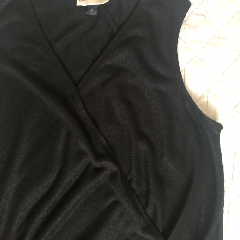 Black dressy top with no sleeve